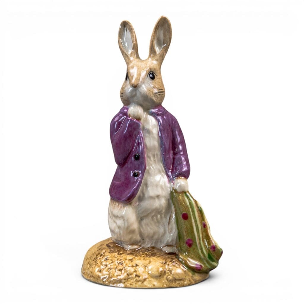 Beswick prototype Beatrix Potter figure Peter and the red pocket handkerchief, painted in a different colourway with Royal Doulton 'not produced for sale' backstamp, h.12.5cm.